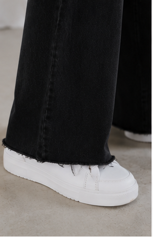 high-waisted wide-leg silhouette.